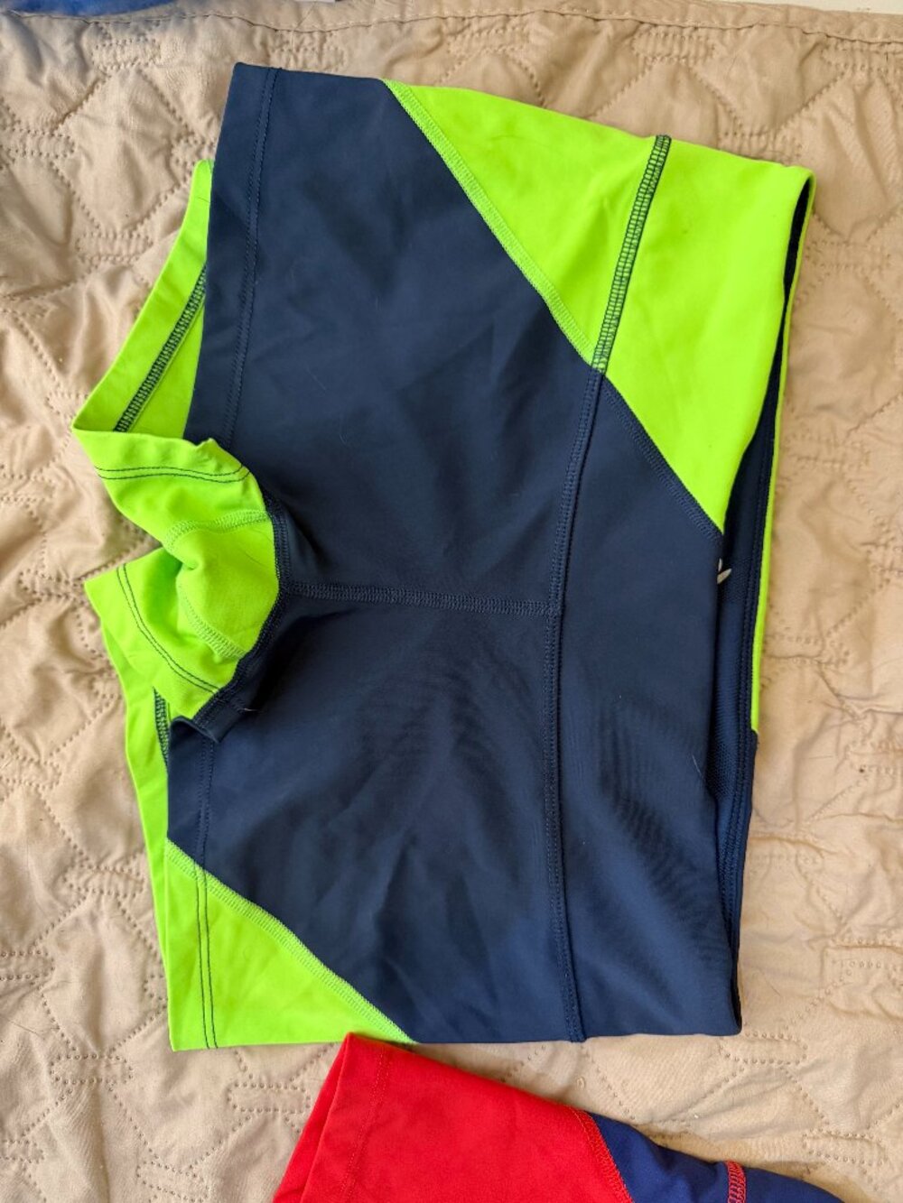 Medium green and blue rabbit racing spandex shorts